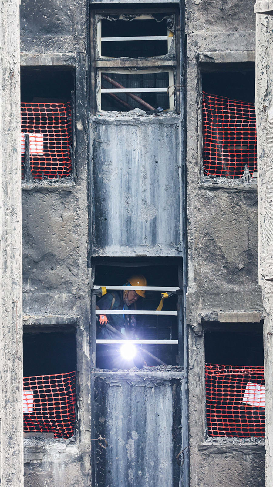 Residents return to ravaged homes months after Hong Kong fire