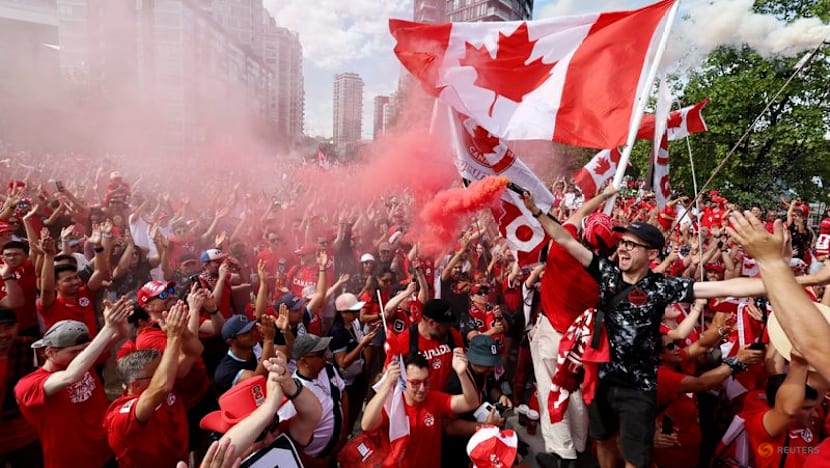 Canada fans on the march turn Vancouver into sea of red and white