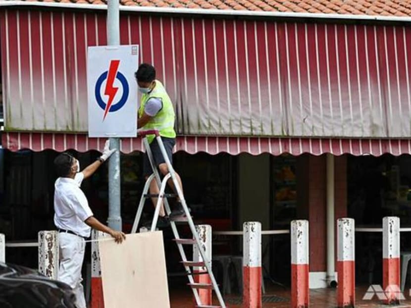 A poster showing the People's Action Party (PAP) logo, seen at Bishan Street 22 on June 30, 2020.