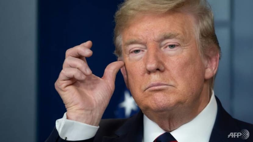 Commentary: Trump fights a two-front war on the coronavirus