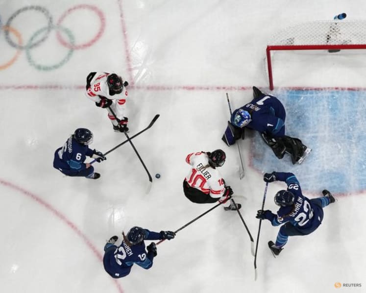 Ice hockey-Canada cruise to shutout win over Finland to seal women's group runners-up spot