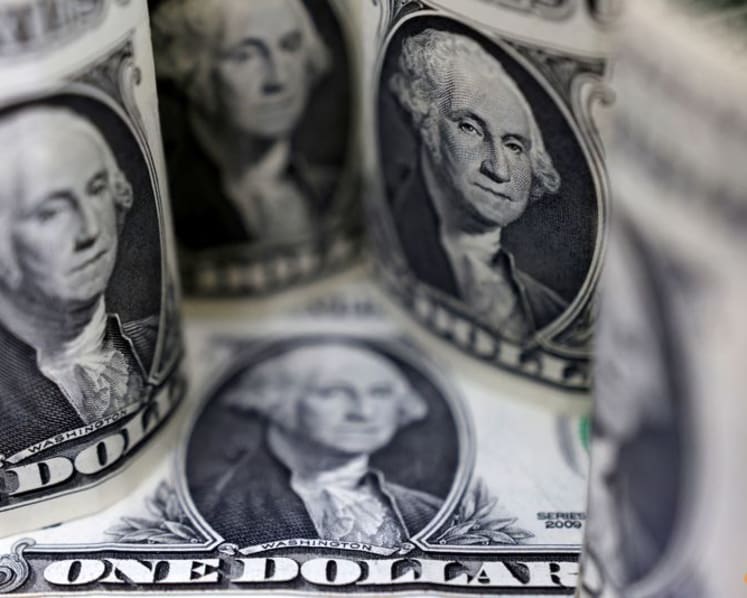 Dollar flat after inflation data, yen set for strongest weekly gain in 15 months