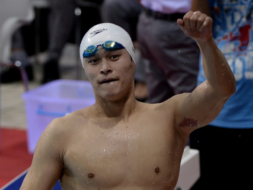 This file photo taken on Sept 4, 2013 shows Olympic gold medallist Sun Yang of Zhejiang Province reacting after winning gold in the Men's 400m Freestyle event during the 12th National China Games in Shenyang, Liaoning Province. A former teammate of banned Olympic champion Sun Yang has given AFP a rare insight into how China drives its swimmers hard from childhood in the pursuit of national glory.