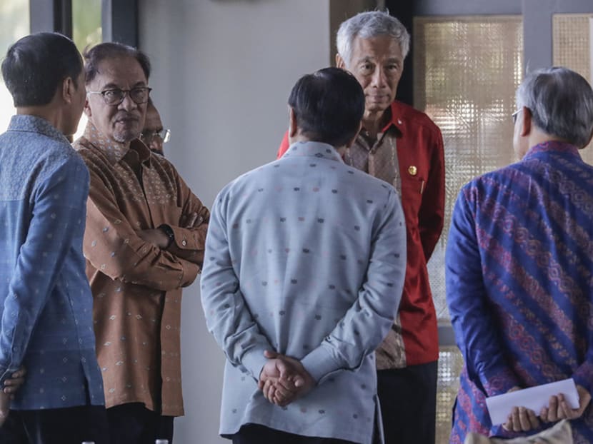 (L-R) Indonesia’s President Joko Widodo, Malaysia’s Prime Minister Anwar Ibrahim, Timor Leste's Prime Minister Taur Matan Ruak, Philippine President Ferdinand Marcos, Singapore’s Prime Minister Lee Hsien Loong and Thailand’s Deputy Prime Minister and Foreign Minister Don Pramudwinai gather prior to a retreat session at the Asean summit in Labuan Bajo on May 11, 2023. (L-R) Indonesia’s President Joko Widodo, Malaysia’s Prime Minister Anwar Ibrahim, Timor Leste's Prime Minister Taur Matan Ruak, Philippine President Ferdinand Marcos, Singapore’s Prime Minister Lee Hsien Loong and Thailand’s Deputy Prime Minister and Foreign Minister Don Pramudwinai gather prior to a retreat session at the Asean summit in Labuan Bajo on May 11, 2023.
