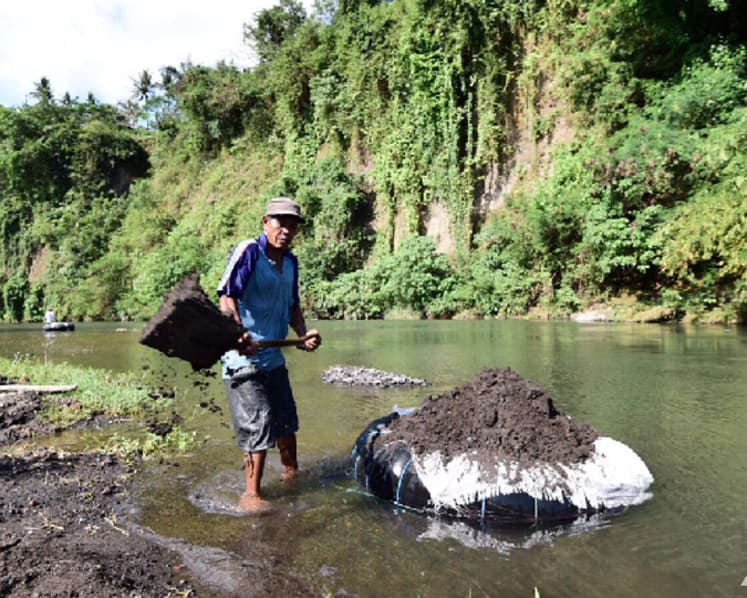 Bali river dredged ahead of probable eruption of Mount Agung