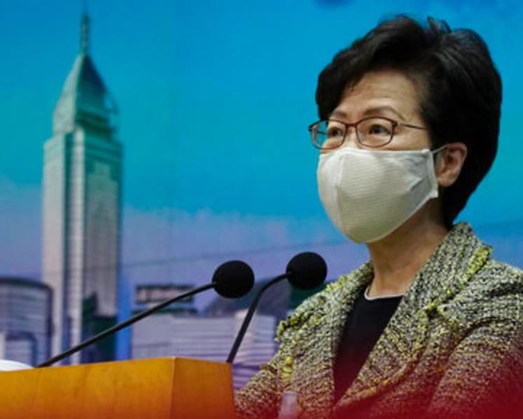 Top Chinese official praises Lam for stabilising Hong Kong