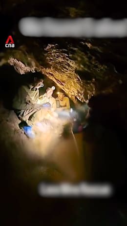 Rescue divers find 5 people trapped in Laos cave
