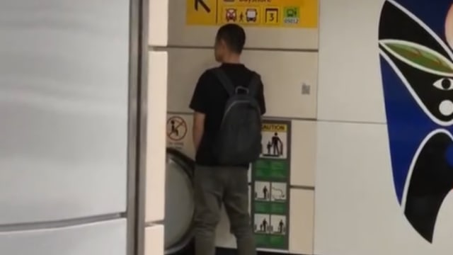 涉在地铁站电动扶梯扶手撒尿 41岁男子被控 