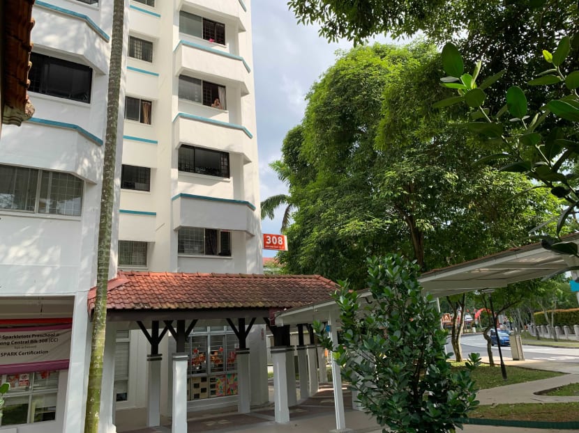 A woman was found with multiple stab wounds lying motionless at the void deck of Block 308 Jurong East Street 32.