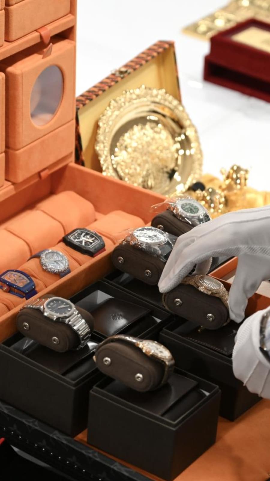 Luxury goods in billion-dollar money laundering case handed over for liquidation