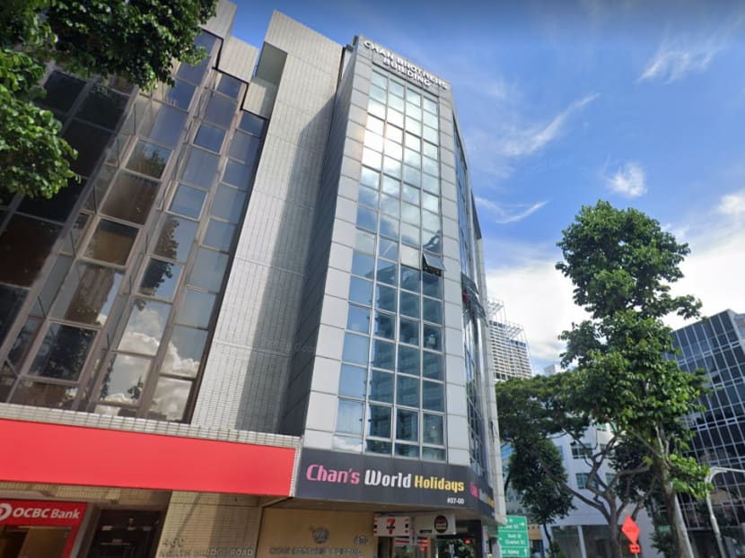 The lift technician who died was trapped in the gap between a lift carriage and a metal support structure at the Chan Brothers Building on North Bridge Road.