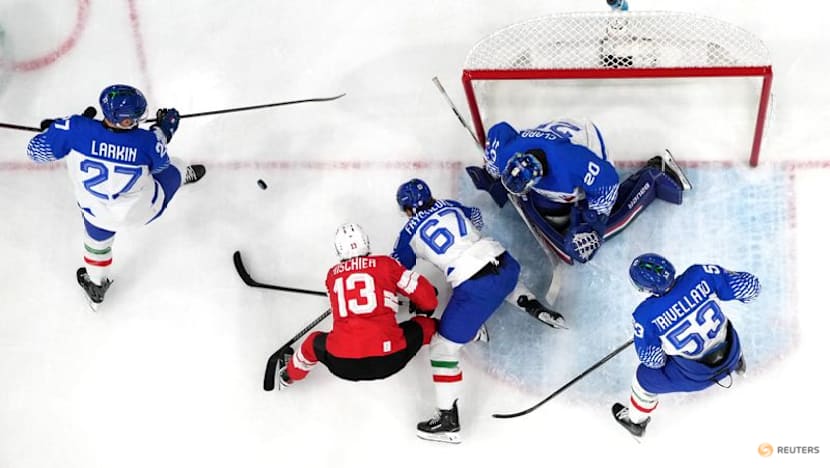 Ice hockey-Swiss ease past Italy to set up quarter-final with Finland