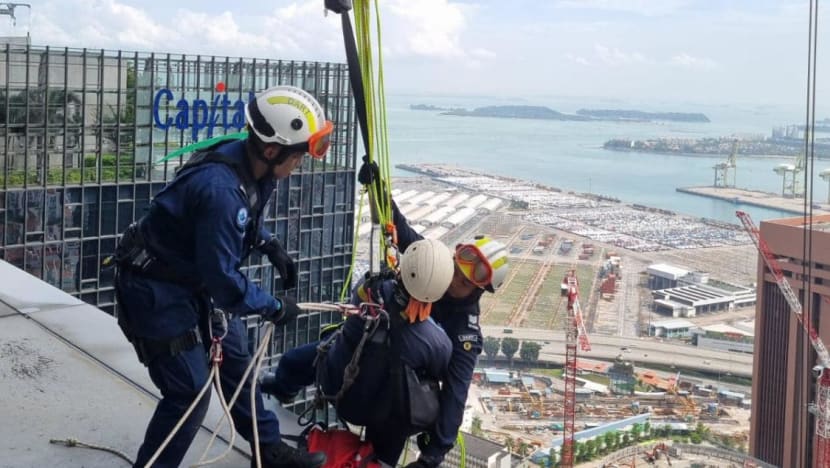 SCDF officers rescue two workers stranded on 40th floor of Capital Tower SCDF officers rescue two workers stranded on 40th floor of Capital Tower
