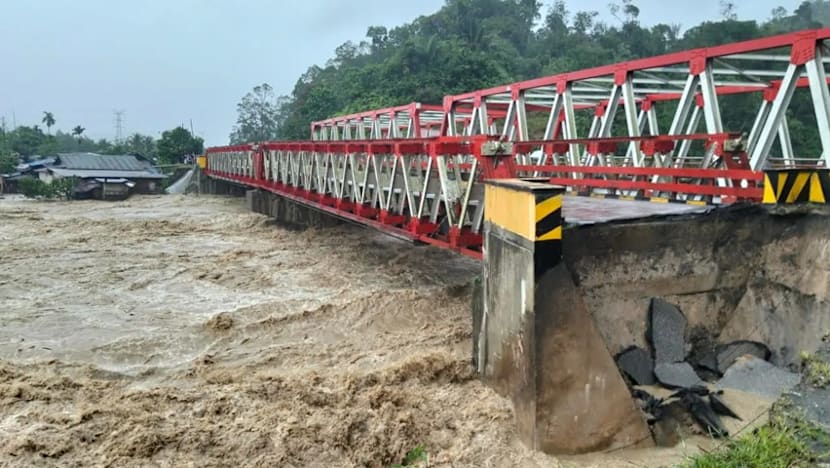 Landslides and flash floods on Indonesia’s Sumatra island leave at least 10 dead and 6 missing