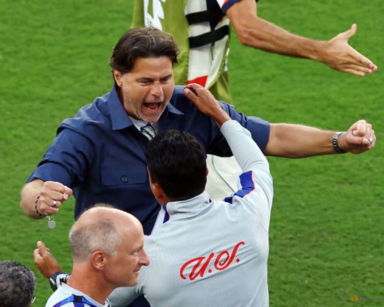 Ten-man United States beat Bosnia 2-0 to reach World Cup round of 16