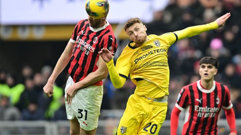 Late goals snatch 3-2 win for Milan over Parma Late goals snatch 3-2 win for Milan over Parma
