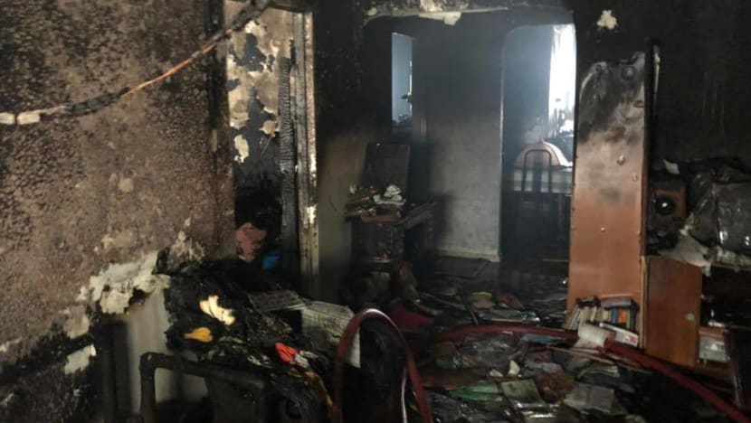 Fire at Woodlands flat caused by PMD left charging; teenager and firefighter suffer burns