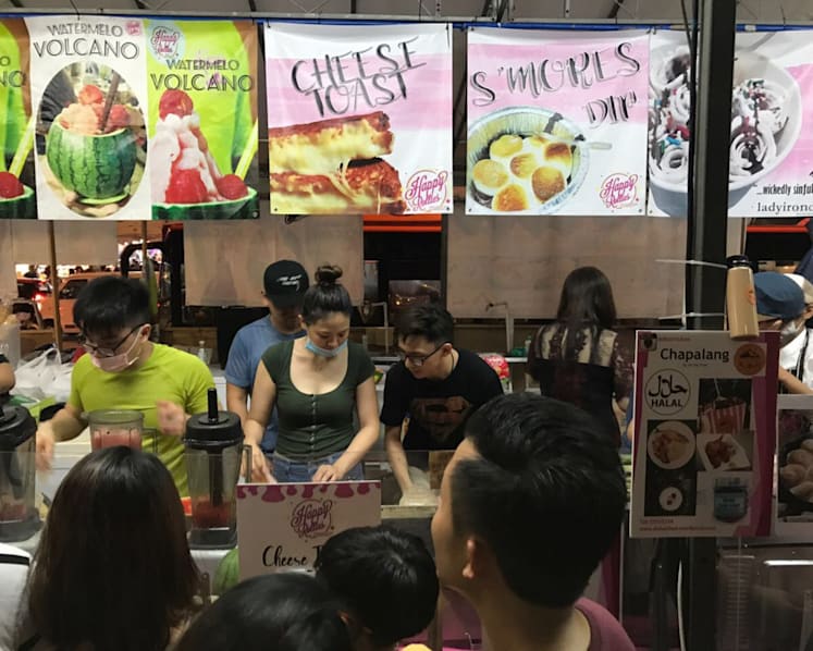More young people setting up pasar malam stalls