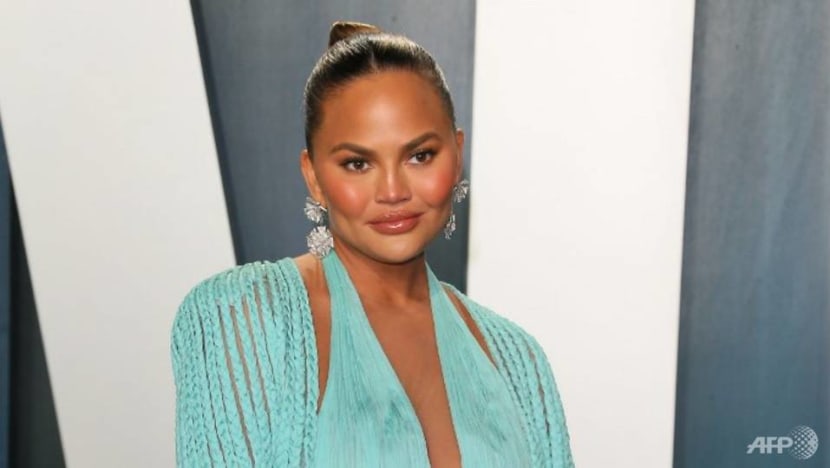 Chrissy Teigen reveals why she had COVID-19 test – for breast implant removal surgery