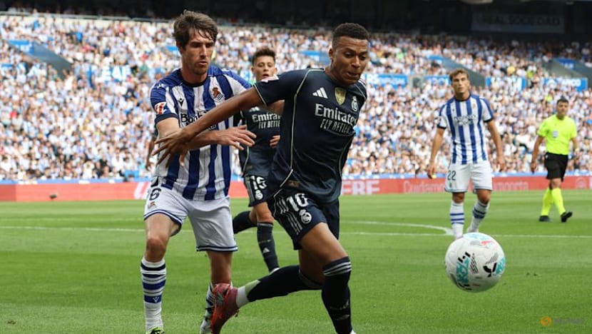 Mbappe shines as 10-Man Real Madrid hold on for 2-1 victory at Real Sociedad