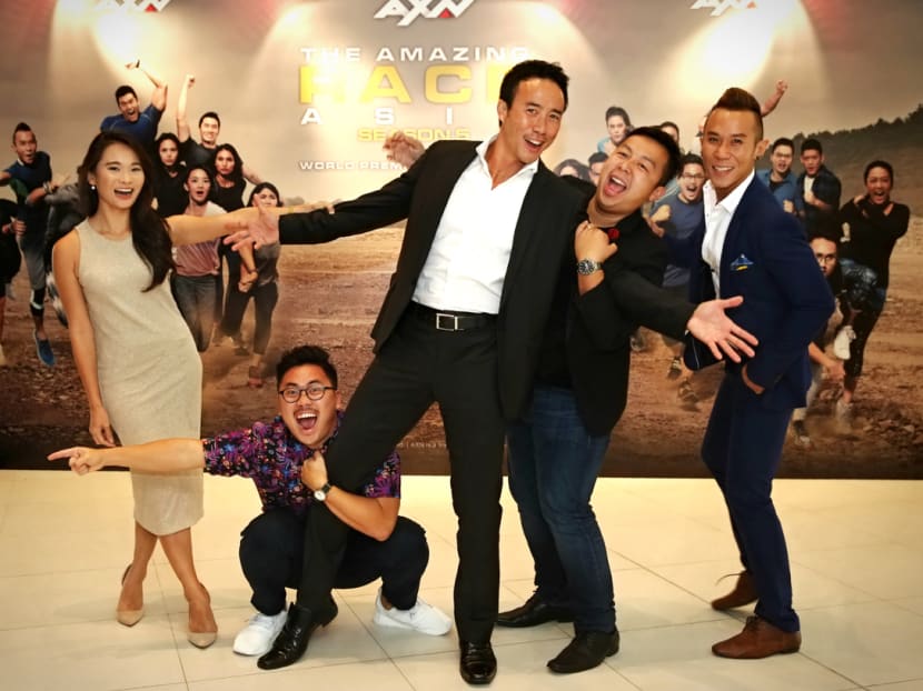 Singaporean contestants for Season 5 of the Amazing Race Asia: (from left) Siblings Rei Umehara, 30, and Keiji Umehara, 26, host Allan Wu, 44, friends Michael Tan, 33, and Jerald Justin Ko, 29. Photo: Nuria Ling/TODAY