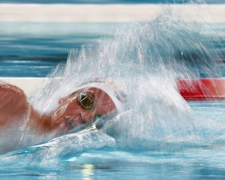 Marchand still the home hero in Paris as new record breakers emerge