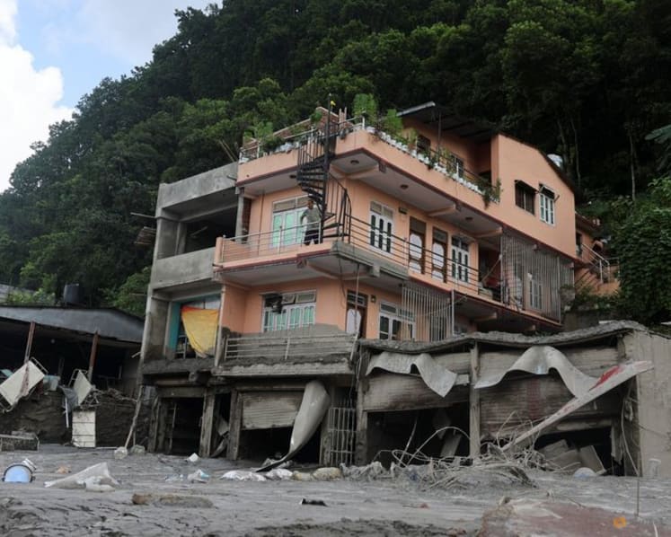 Nepal and China resume flood rescue after lake threat eases, death toll tops 500
