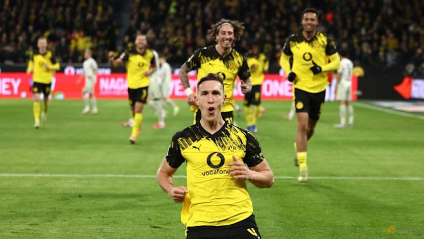 Dortmund ease past Werder 3-0 to stretch unbeaten run