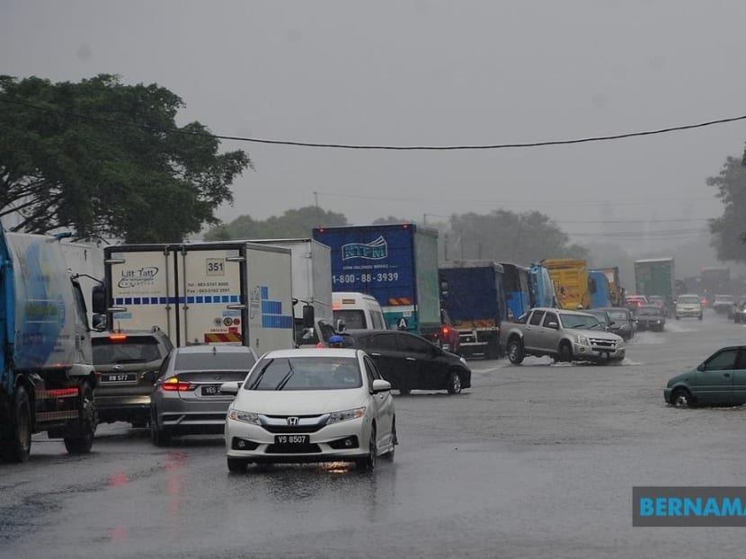 Thousands evacuated as floods hit several Malaysian states; Port Klang operations affected