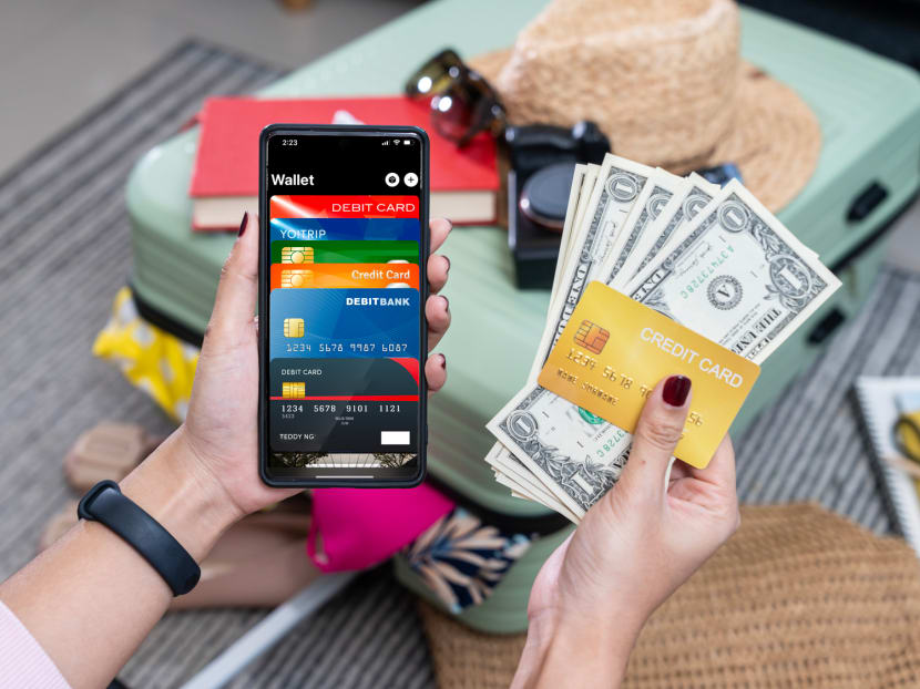 Cash vs contactless: How Singaporeans can pay smart abroad