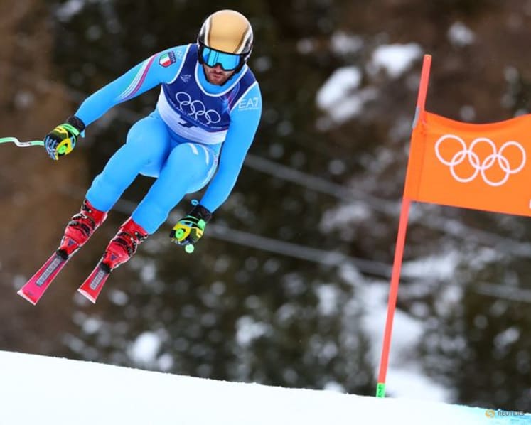 Alpine skiing-Italian trio set pace in sun-kissed downhill training