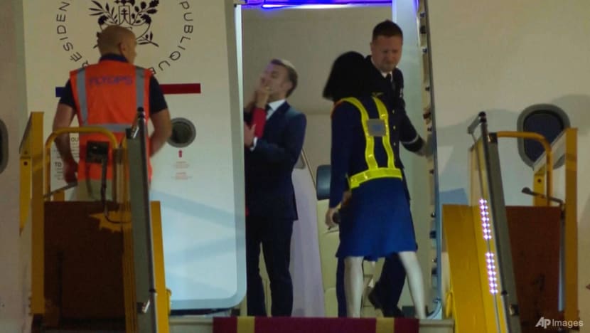 Macron plays down apparent shove from wife in Vietnam Macron plays down apparent shove from wife in Vietnam