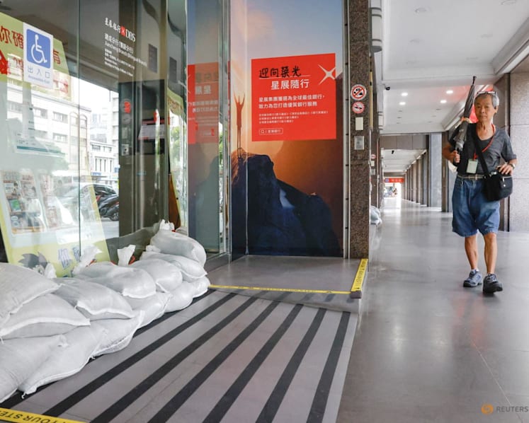 Japan's southwestern islands on high alert as powerful Typhoon Bavi approaches; storm-linked landslide kills 10 in Philippines