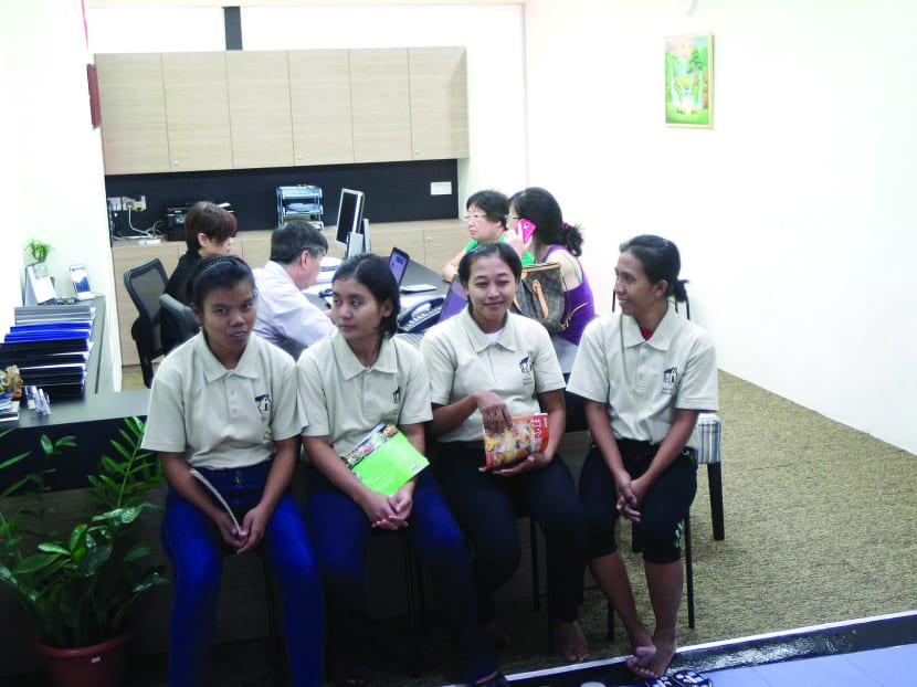 A maid agency at Bukit Timah Shopping Centre yesterday. The MOM said at the time it visited maid agencies in the shopping centres mentioned in the report but did not find any inappropriate displays of maids. Photo: Wee Teck Hian