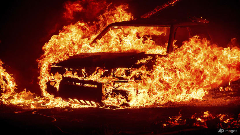 Scores of wildfires scorching swathes of the US and Canada 