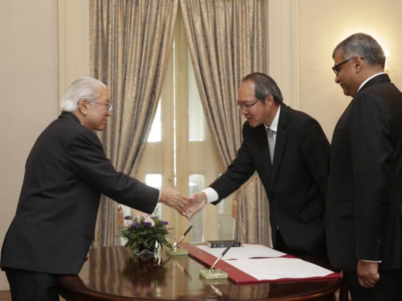 Swearing-in and Appointment Ceremony of Lucien Wong (centre) as Attorney-General and Member of Presidential Council for Minority Rights and Chief Justice Sundaresh Menon (right) as a witness for the ceremony at Istana. TODAY file photo