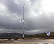 Israel police say two dead in stabbing, car ramming attack by Palestinian