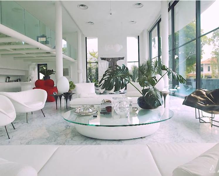 A 9,300 sq ft home in Singapore with glass floors and plenty of curves