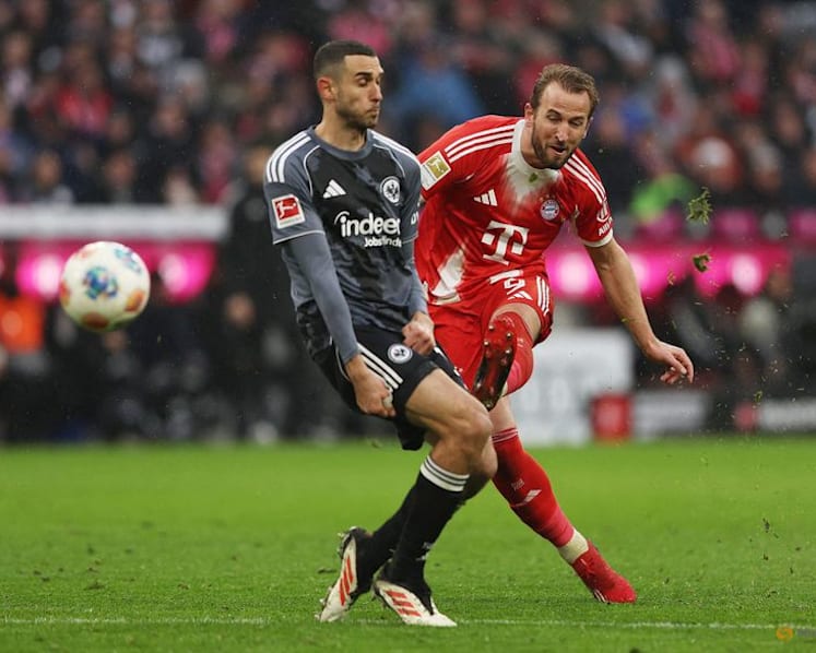 Kane double sends Bayern nine points clear after late Frankfurt scare