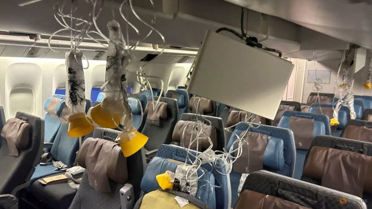 Widow of British passenger who died after SQ321 turbulence sues Singapore Airlines