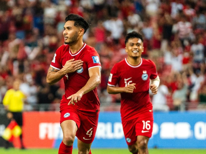Singapore's Christopher van Huizen celebrates after scoring against Guam at the National Stadium on Oct 12, 2023.

