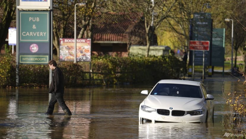 Hundreds of homeowners in England and Wales battle floodwaters after weekend storm