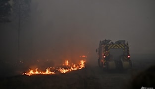 France, Spain race to contain 'monster' fires ahead of new heatwave