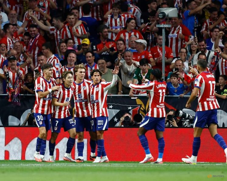 Atletico Madrid beat Malaga but Alvarez absence is felt