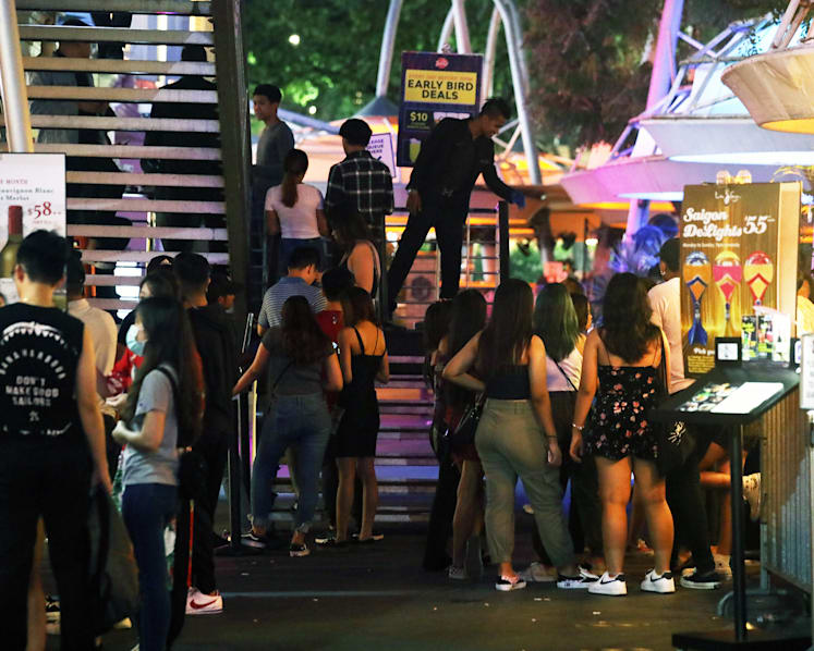 ‘One last night of fun’: Revellers throng nightspots before closures, but merrymaking masks worries over shattered livelihoods