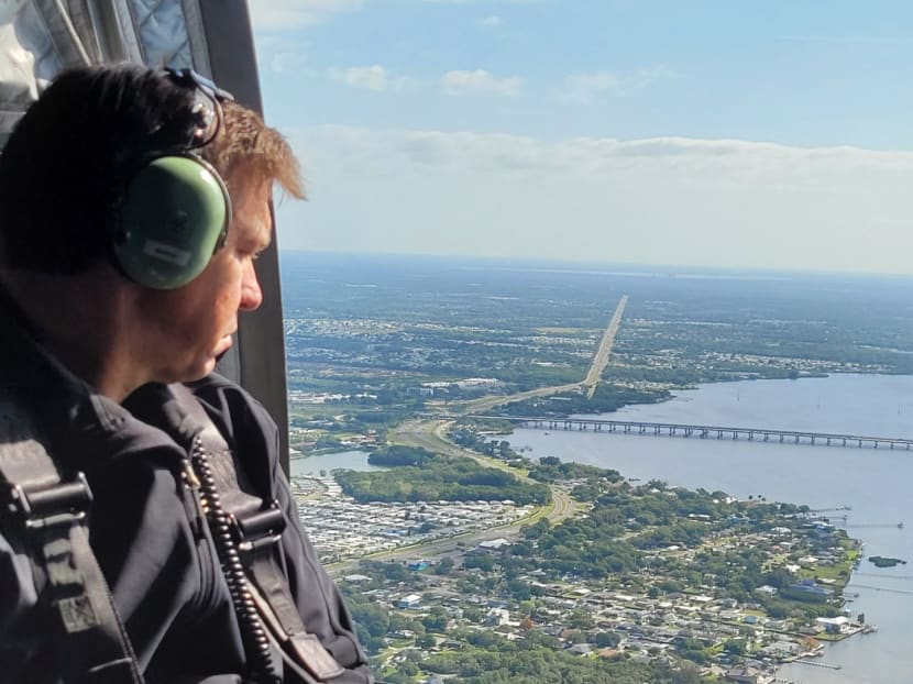 The Governor of Florida, Mr Ron DeSantis, tours the area over Piney Point after an emergency was declared after a leaking toxic wastewater reservoir, threatened nearby homes and an environmental disaster, near Tampa Bay, Florida, US on April 4, 2021.
