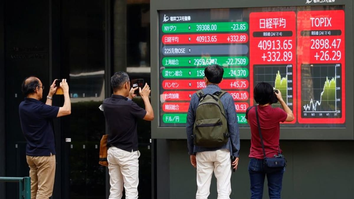 Japan's Topix tops 3,000 for first time on tariff clarity; SoftBank soars
