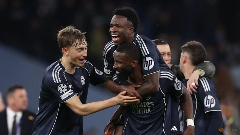 Vinicius Jr nets double as Real Madrid dispatch Man City in Champions League last 16