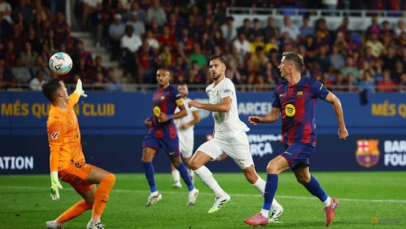 Barcelona demolish Valencia 6-0 in front of small crowd