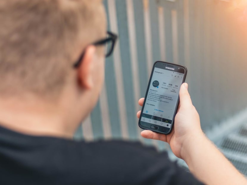 Commentary: Why guys who post a lot on social media are seen as less manly